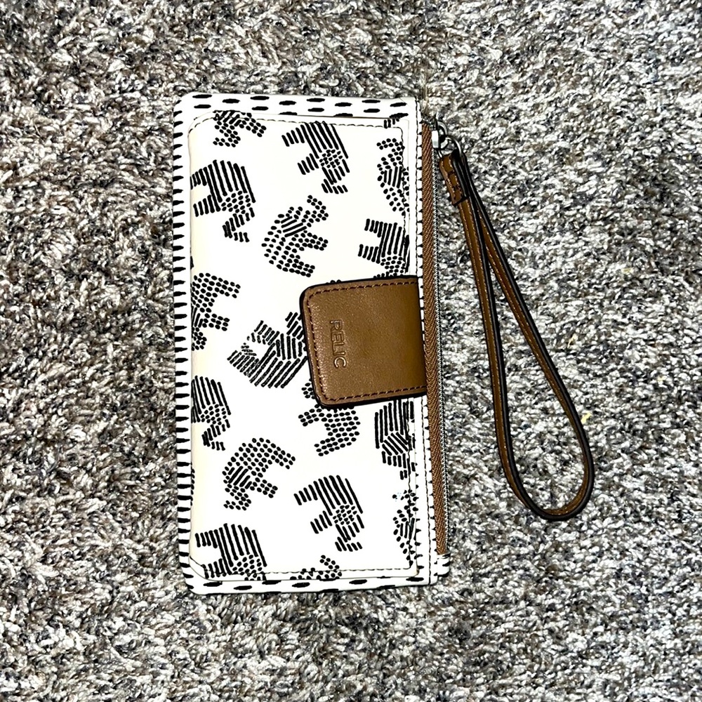 white and brown wallet